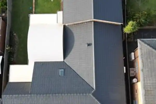 Full roof restoration service fixing leaks, cracks, and worn-out tiles