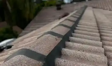 Roof repair after washing to fix cracks, leaks, and damaged tiles